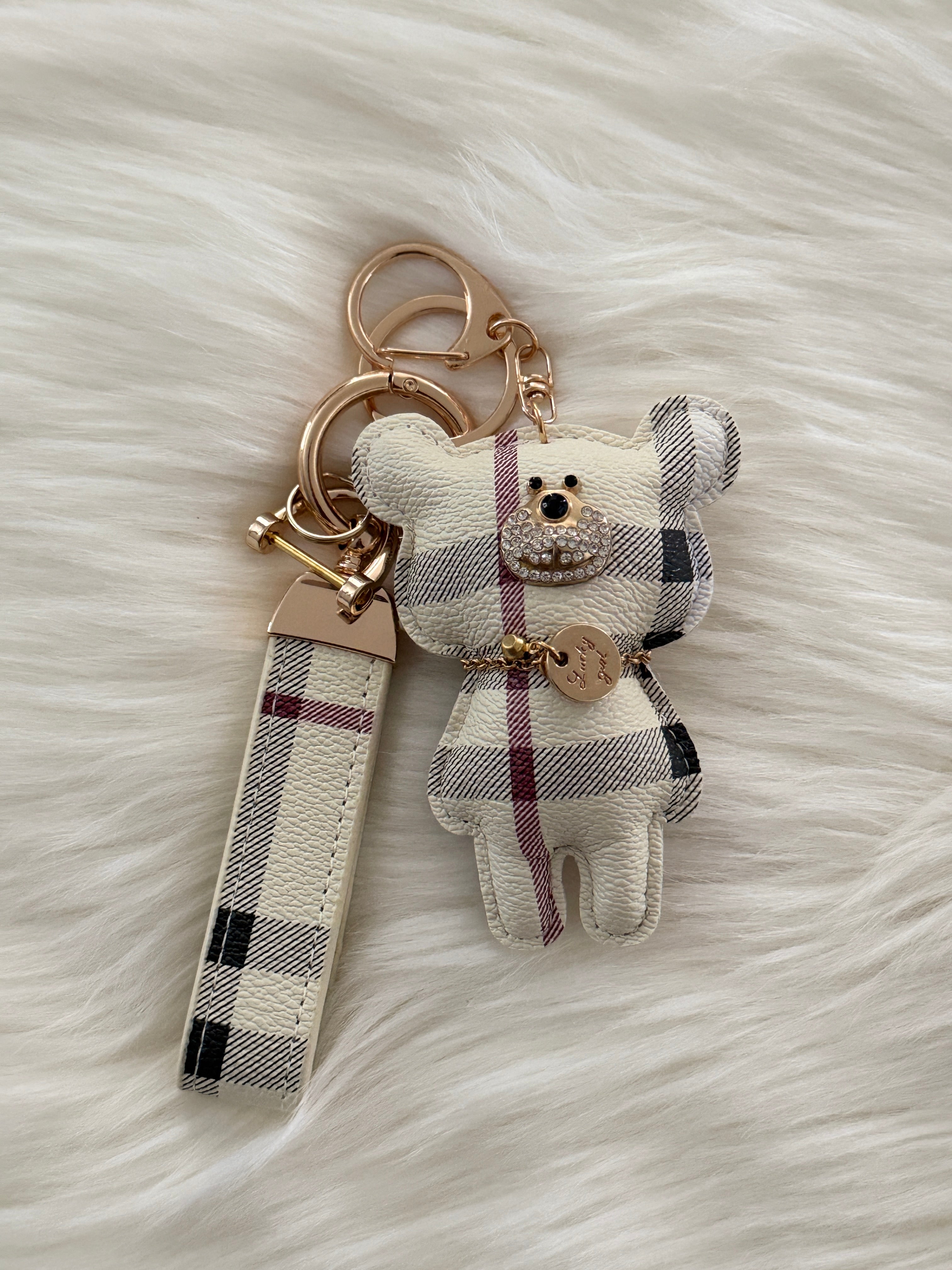 Plaid teddy charm keychain with matching strap and clasp.